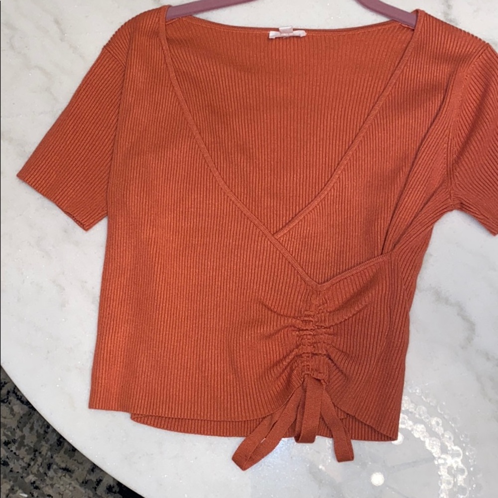Medium shirt, rusty orange color